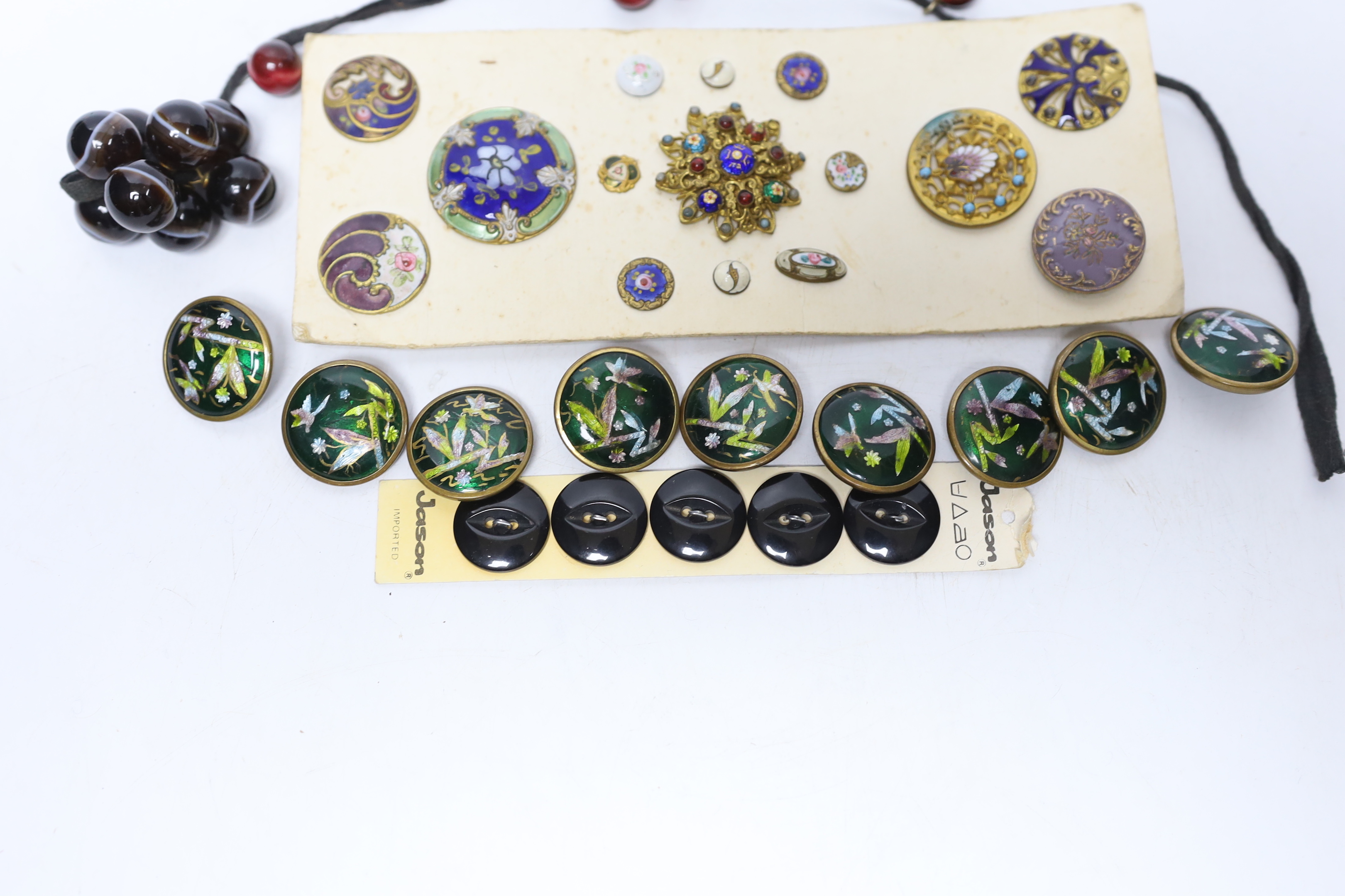 A quantity of enamel buttons, etc.